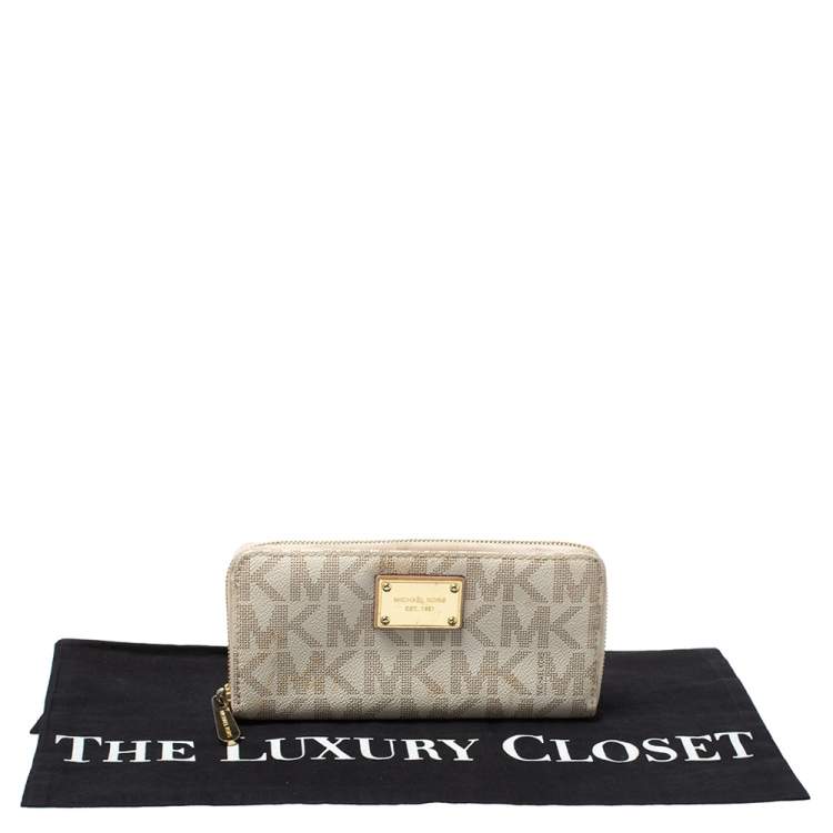 Pre Owned Michael Kors White Monogram Coated Canvas Zip Around Wallet