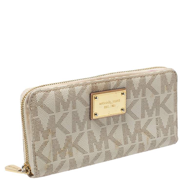 Pre Owned Michael Kors White Monogram Coated Canvas Zip Around Wallet