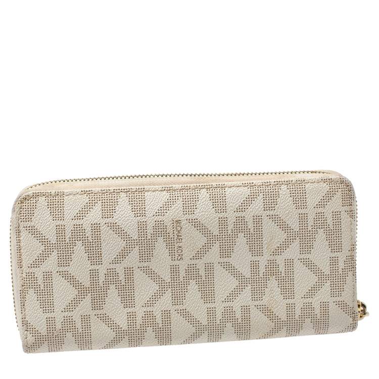 Pre Owned Michael Kors White Monogram Coated Canvas Zip Around Wallet