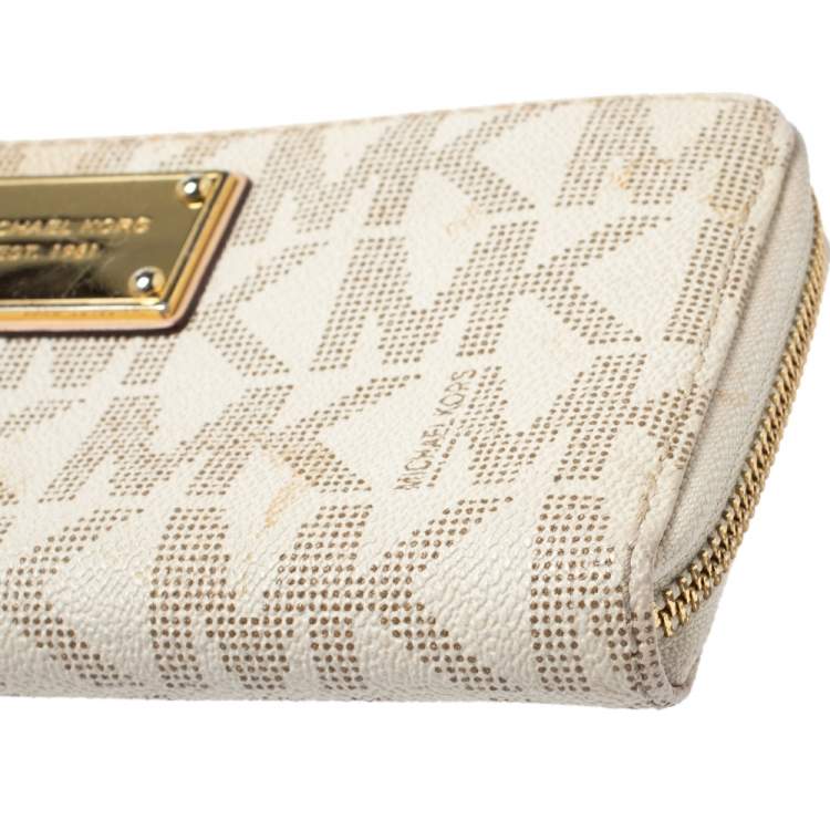 Pre Owned Michael Kors White Monogram Coated Canvas Zip Around Wallet