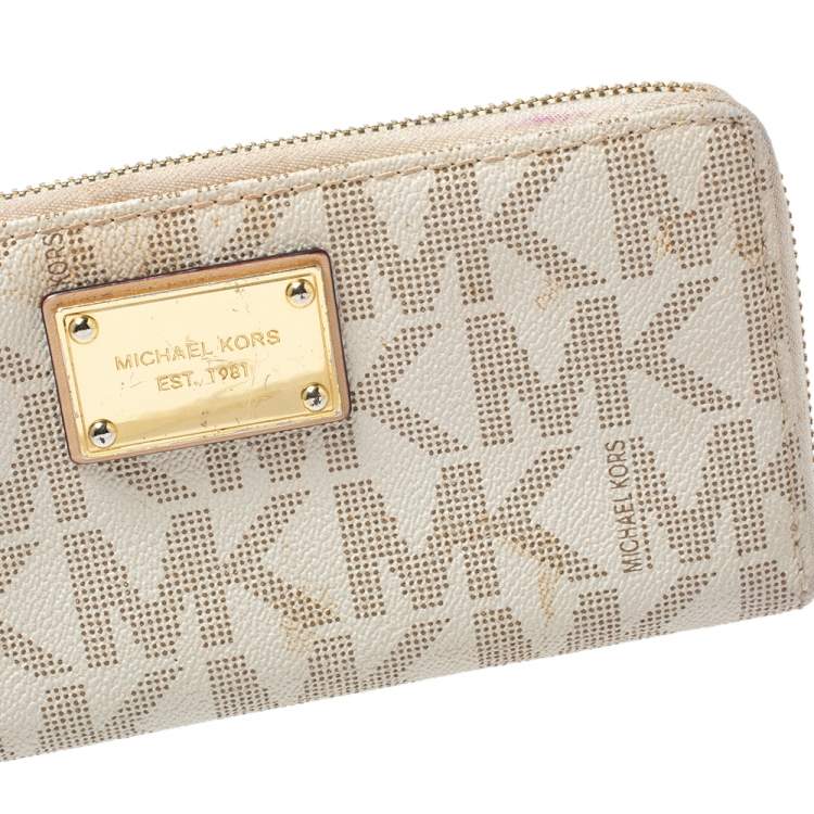 Pre Owned Michael Kors White Monogram Coated Canvas Zip Around Wallet