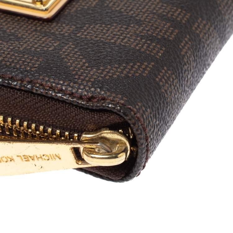 Pre Owned Michael Kors Brown Signature Coated Canvas Zip Around Wallet