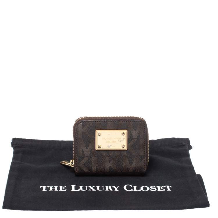 Pre Owned Michael Kors Brown Signature Coated Canvas Zip Around Wallet