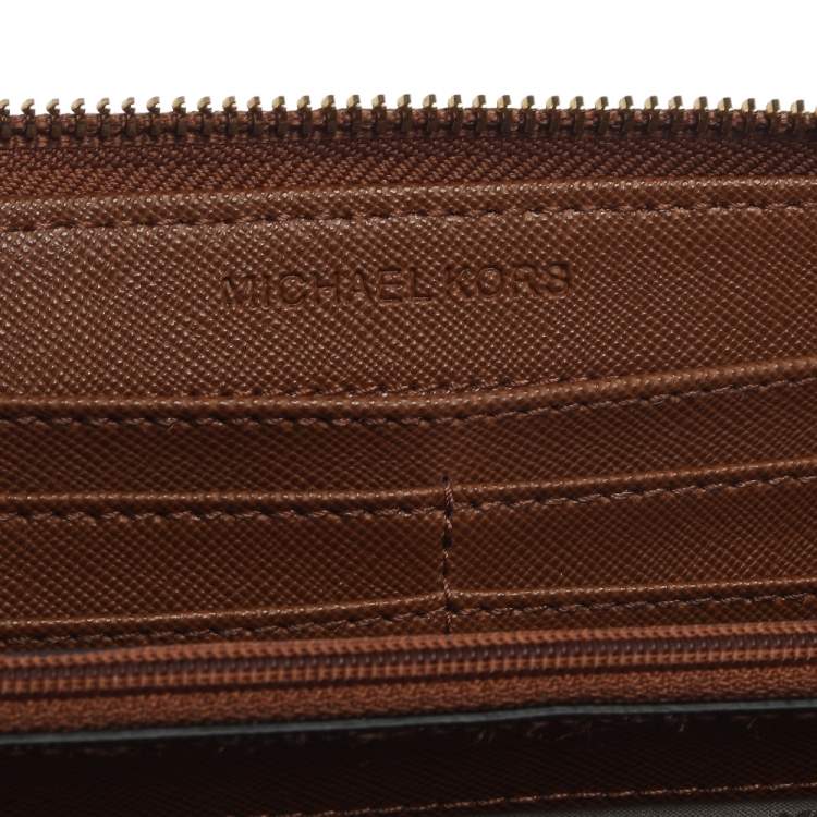 Pre Owned Michael Kors Tan Saffiano Leather Travel Zip Around Continental Wallet