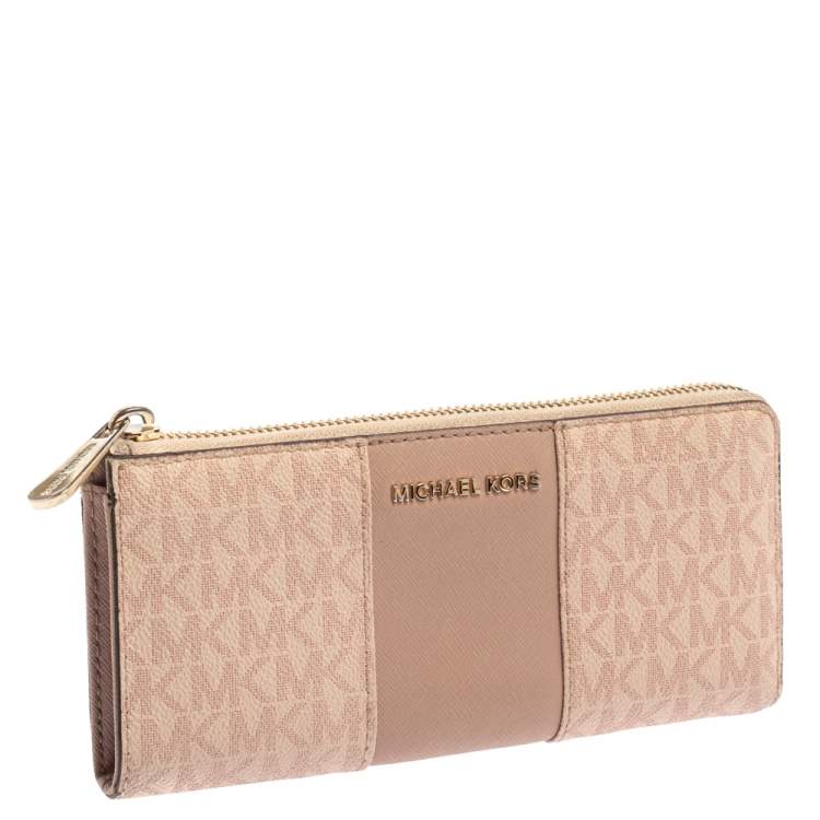 Pre Owned Michael Kors Pink Signature Leather Zip Around Wallet