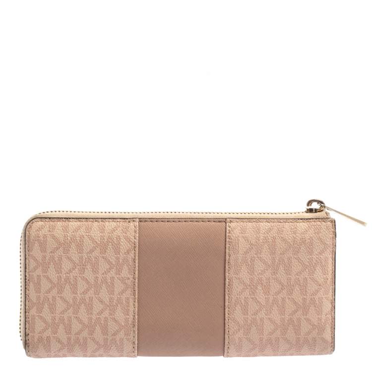 Pre Owned Michael Kors Pink Signature Leather Zip Around Wallet