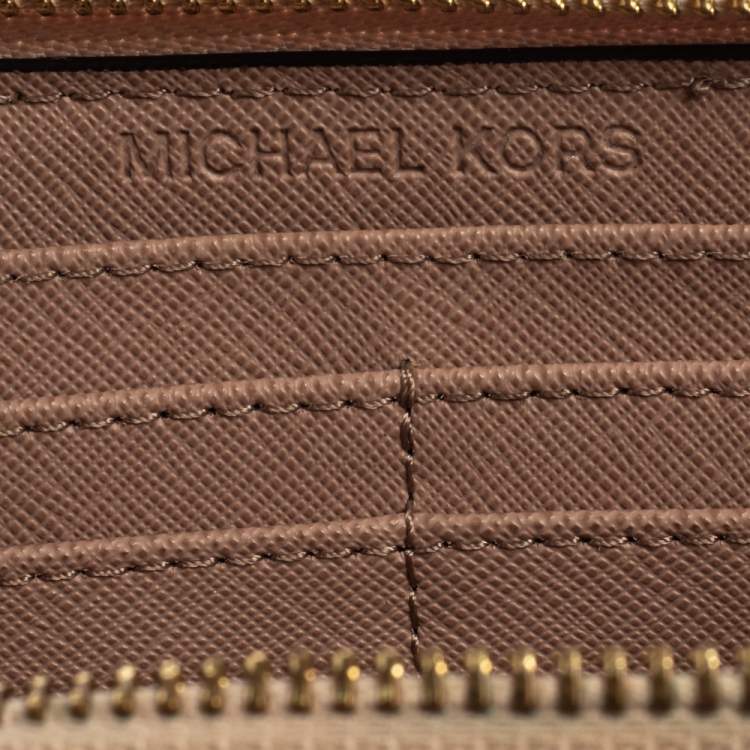 Pre Owned Michael Kors Pink Signature Leather Zip Around Wallet