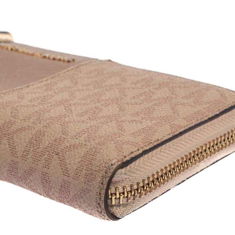 Pre Owned Michael Kors Pink Signature Leather Zip Around Wallet