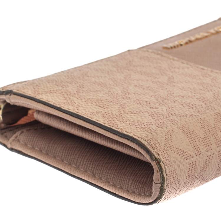 Pre Owned Michael Kors Pink Signature Leather Zip Around Wallet