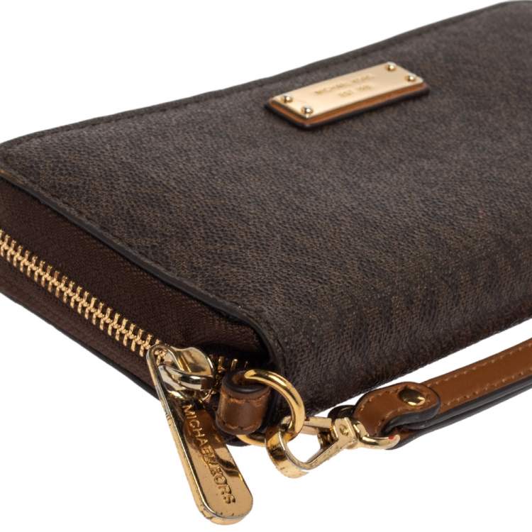 Pre Owned Michael Kors Brown Monogram Coated Canvas Zip Around Wristlet Wallet