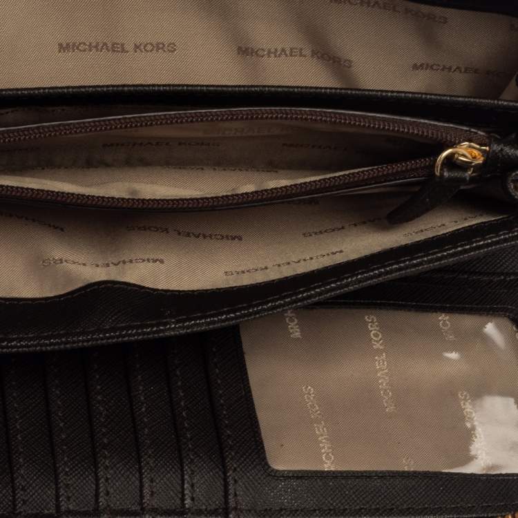 Pre Owned Michael Kors Brown Monogram Coated Canvas Zip Around Wristlet Wallet