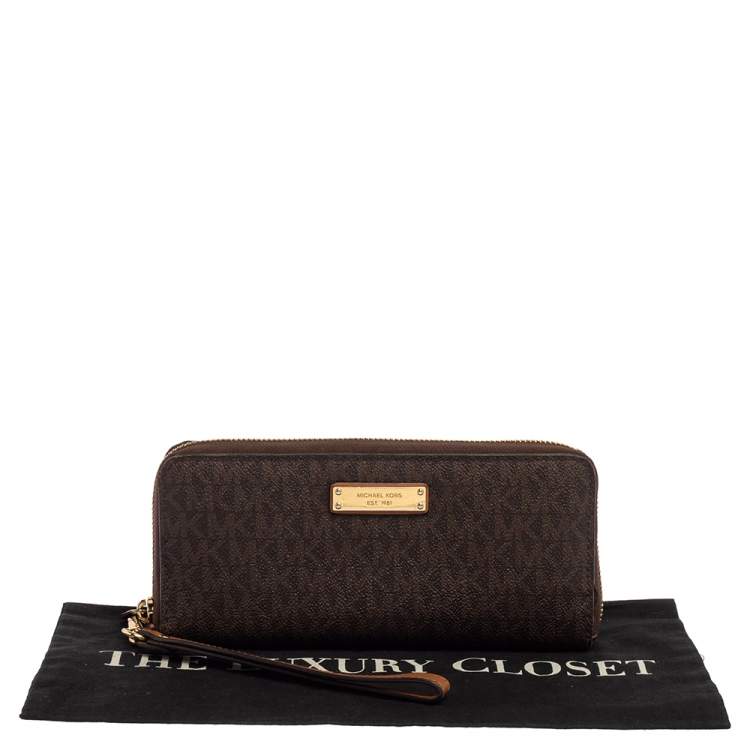 Pre Owned Michael Kors Brown Monogram Coated Canvas Zip Around Wristlet Wallet