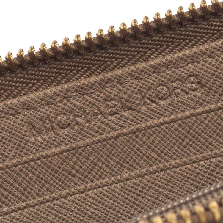 Pre Owned Michael Kors Beige Leather Zip Around Wristlet Wallet