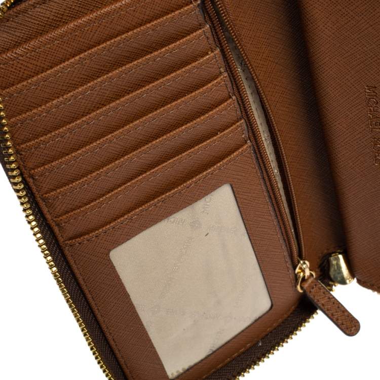 Pre Owned Michael Kors Brown Monogram Coated Canvas Zip Around Wallet