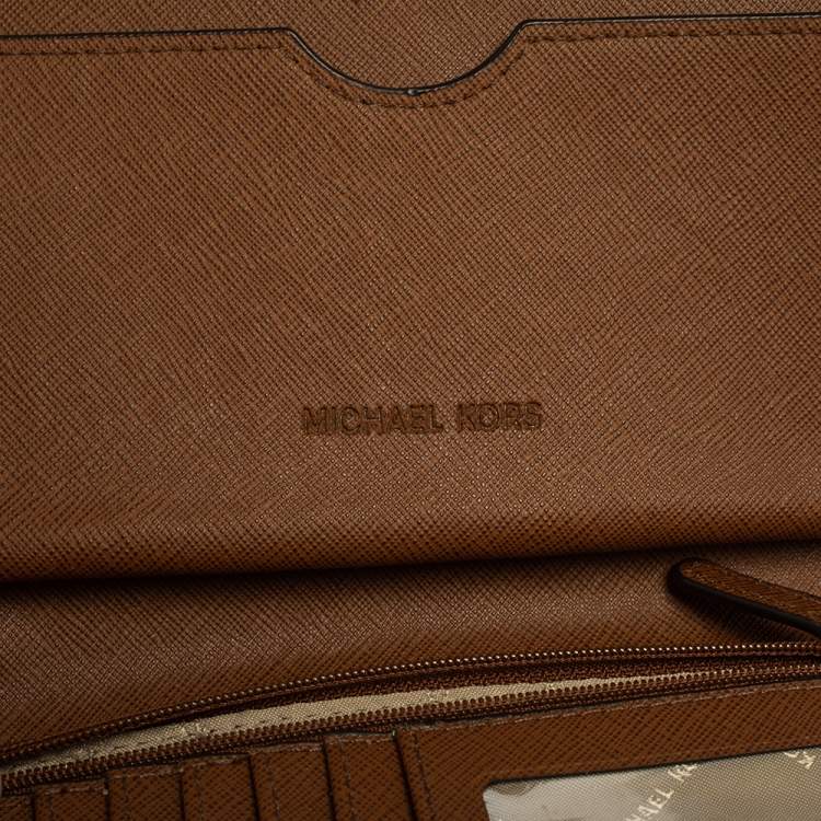 Pre Owned Michael Kors Brown Monogram Coated Canvas Zip Around Wallet
