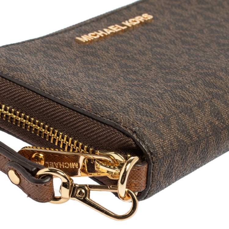 Pre Owned Michael Kors Brown Monogram Coated Canvas Zip Around Wallet