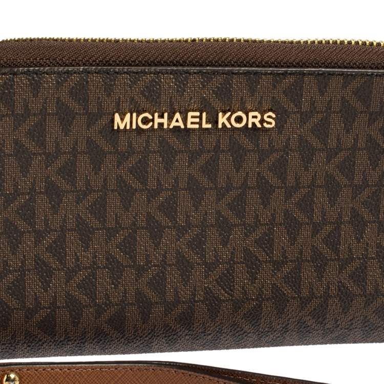 Pre Owned Michael Kors Brown Monogram Coated Canvas Zip Around Wallet
