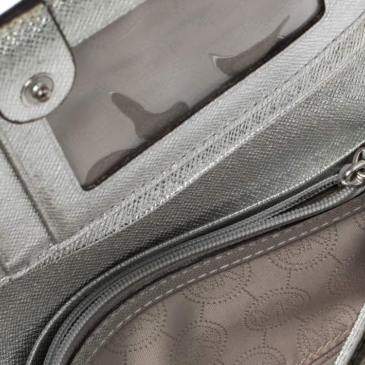 Pre Owned Michael Kors Metallic Silver Signature Coated Canvas Bifold Wallet