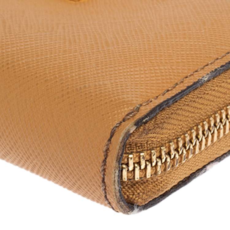 Pre Owned Michael Kors Tan Leather Zip Around Wristlet Wallet.