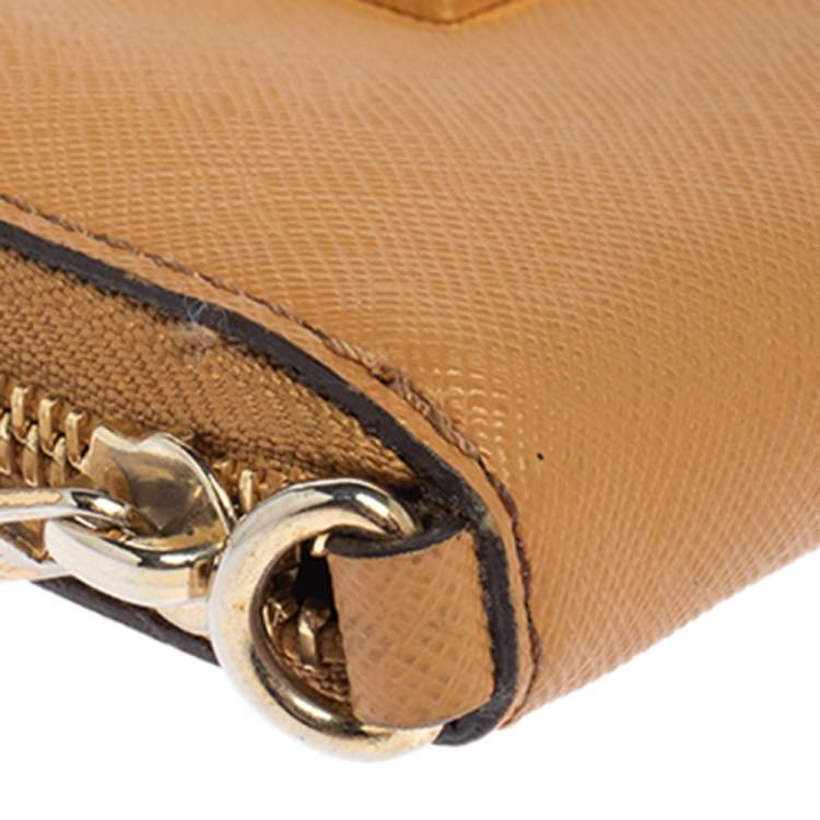 Pre Owned Michael Kors Tan Leather Zip Around Wristlet Wallet.