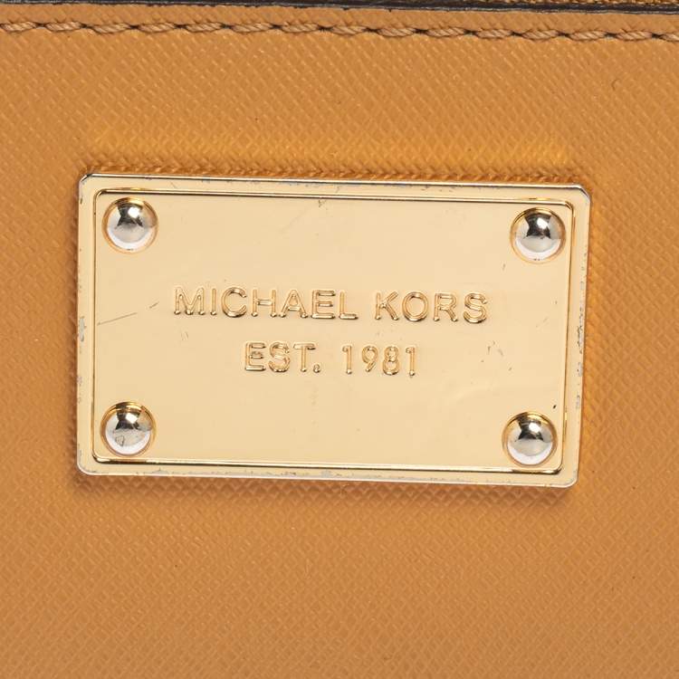 Pre Owned Michael Kors Tan Leather Zip Around Wristlet Wallet.