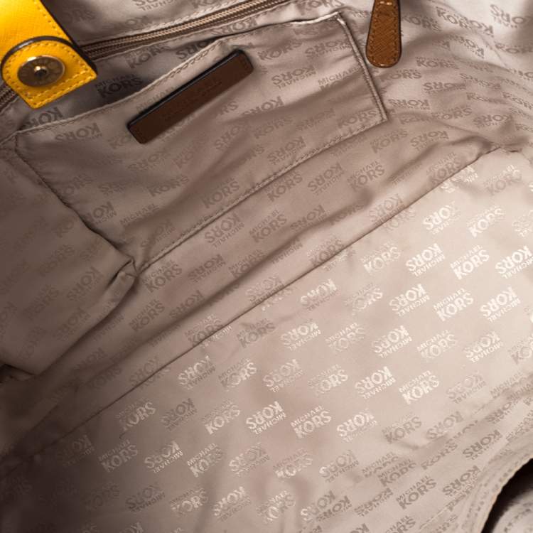 Pre Owned MICHAEL Michael Kors Yellow/White Striped Leather Medium Jet Set Travel Tote