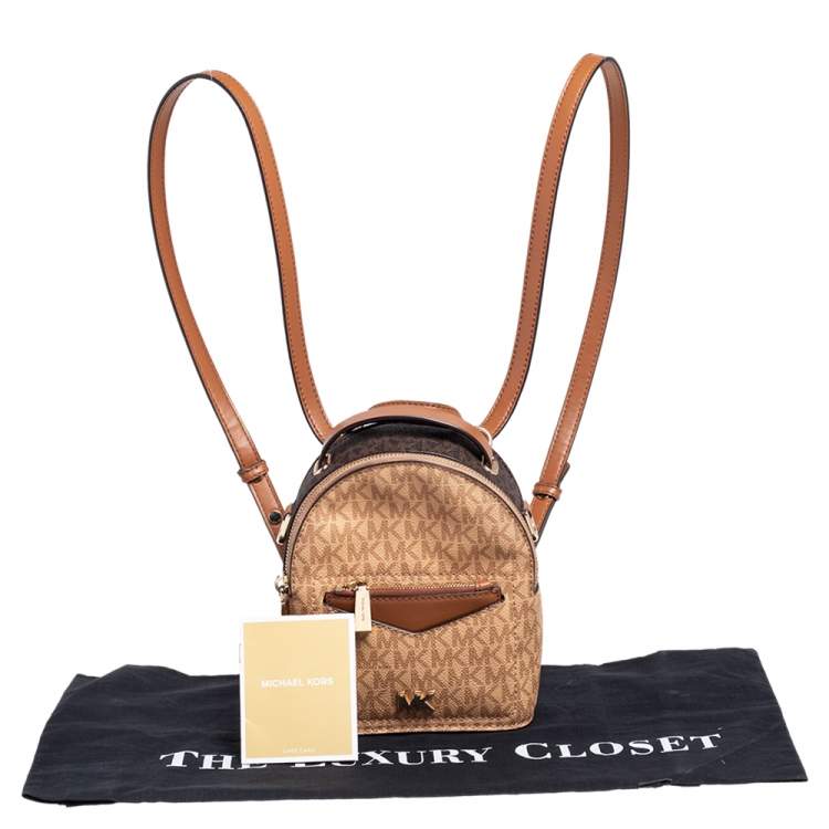 Pre Owned Michael Kors Brown/Tan Signature Coated Canvas and Leather Jessa Small Convertible Backpack