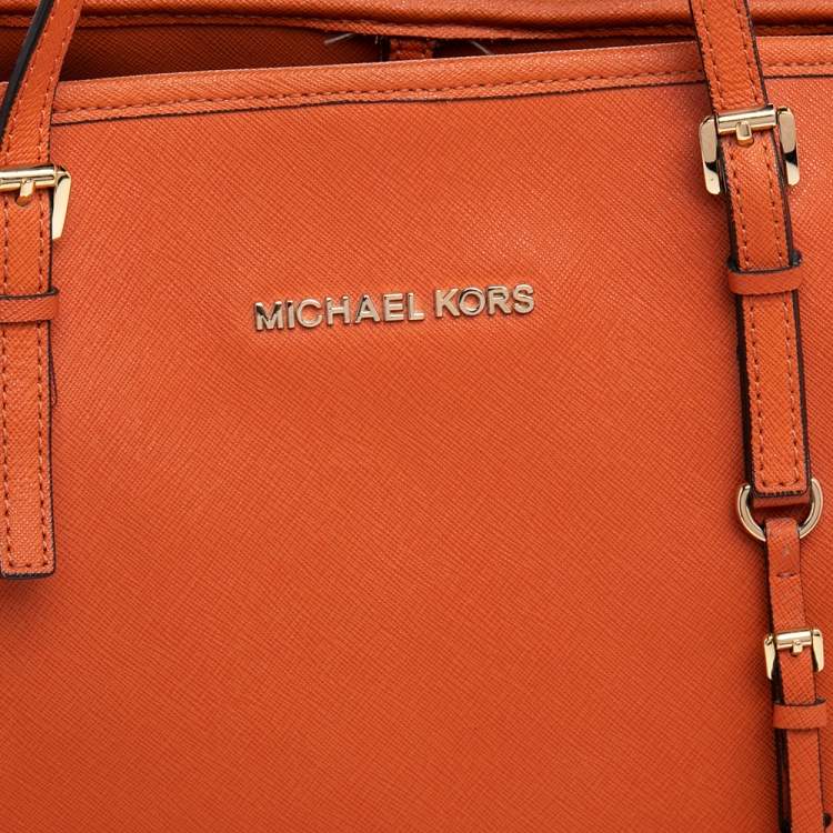 Pre Owned Michael Kors Orange Leather Large Jet Set Travel Tote