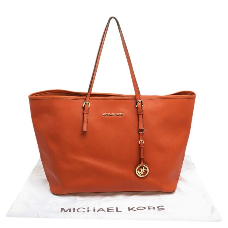 Pre Owned Michael Kors Orange Leather Large Jet Set Travel Tote
