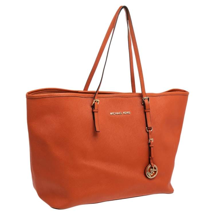 Pre Owned Michael Kors Orange Leather Large Jet Set Travel Tote