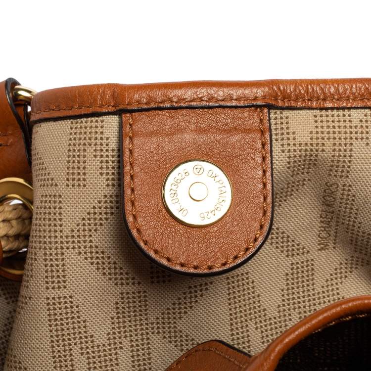 Pre Owned MICHAEL Michael Kors Brown/Tan Signature Coated Canvas and Leather Marina Drawstring Tote