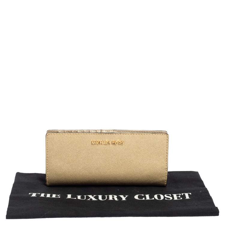 Pre Owned Michael Kors Gold Leather Jet Set Travel Bifold Wallet