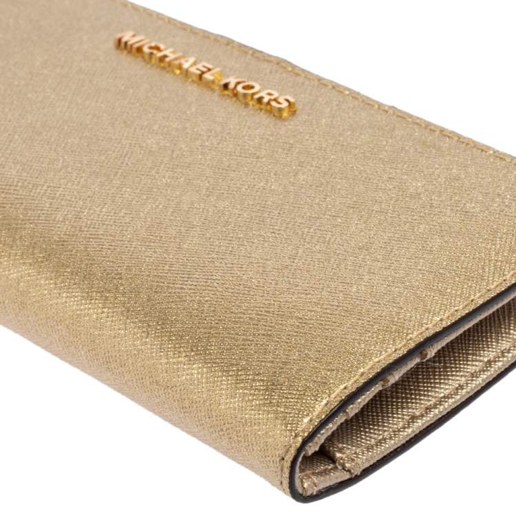 Pre Owned Michael Kors Gold Leather Jet Set Travel Bifold Wallet