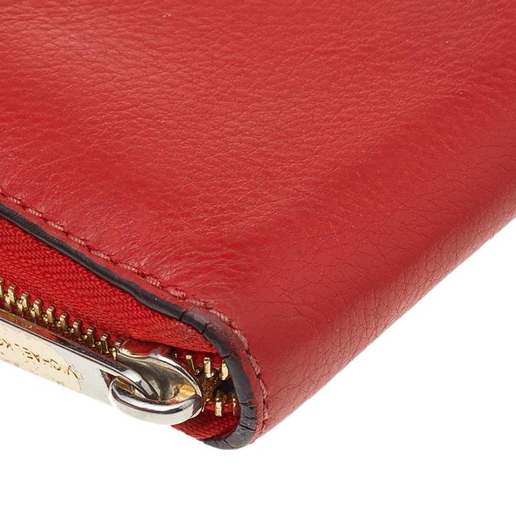 Pre Owned Michael Kors Orange Leather Bedford Zip Around Wallet