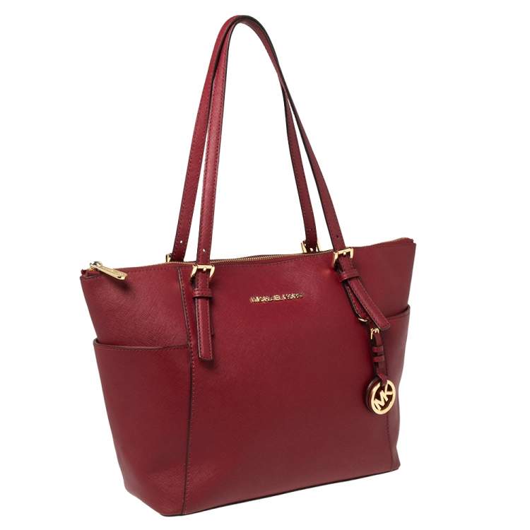 Pre Owned MICHAEL Michael Kors Red Leather Medium Jet Set Top Zip Tote