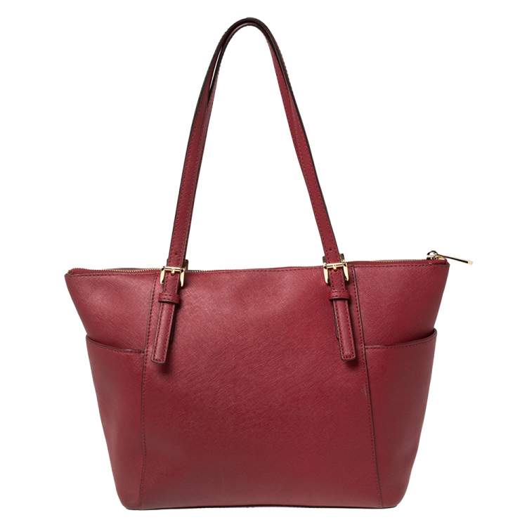 Pre Owned MICHAEL Michael Kors Red Leather Medium Jet Set Top Zip Tote