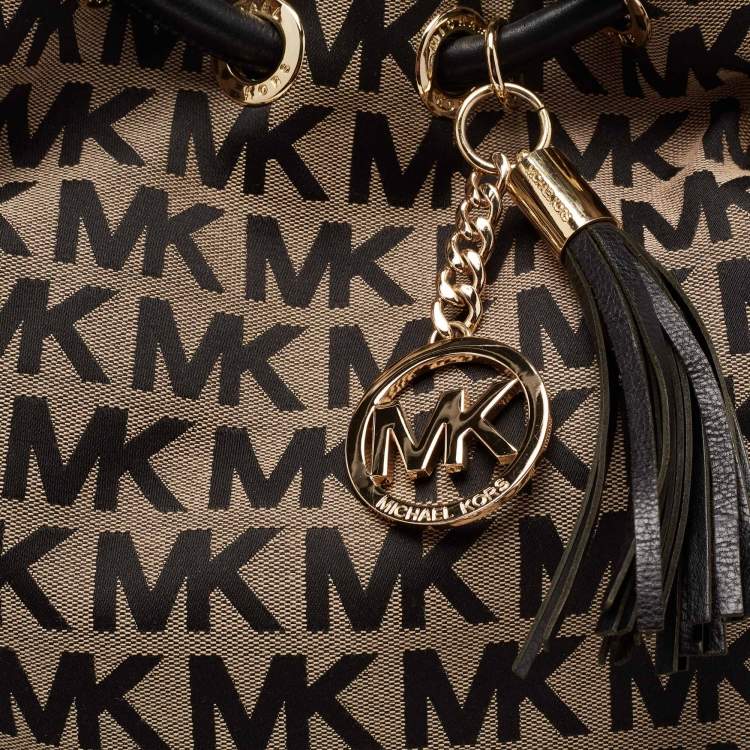 Pre Owned Michael Kors Beige/Black Signature Canvas and Leather Jet Set Drawstring Bag