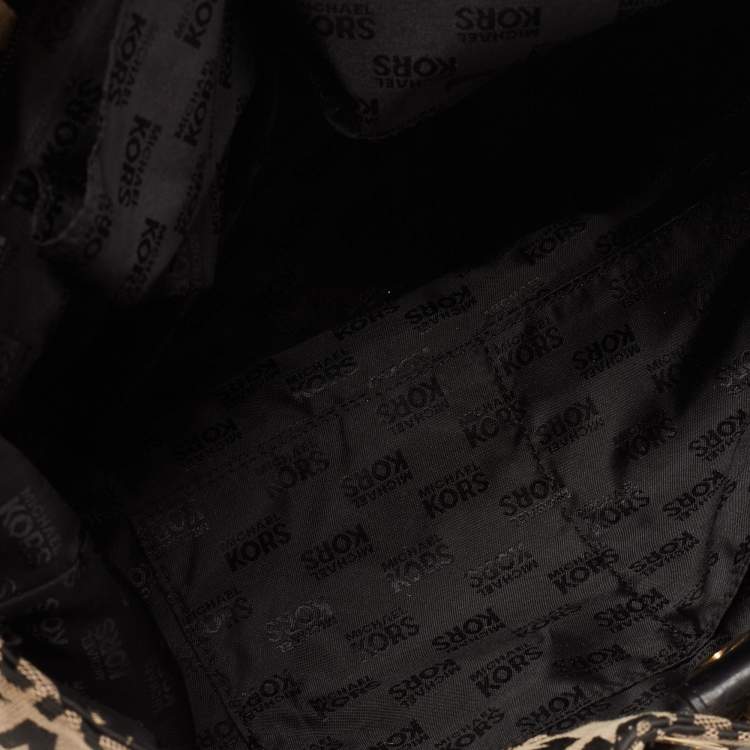 Pre Owned Michael Kors Beige/Black Signature Canvas and Leather Jet Set Drawstring Bag