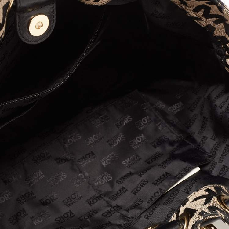 Pre Owned Michael Kors Beige/Black Signature Canvas and Leather Jet Set Drawstring Bag
