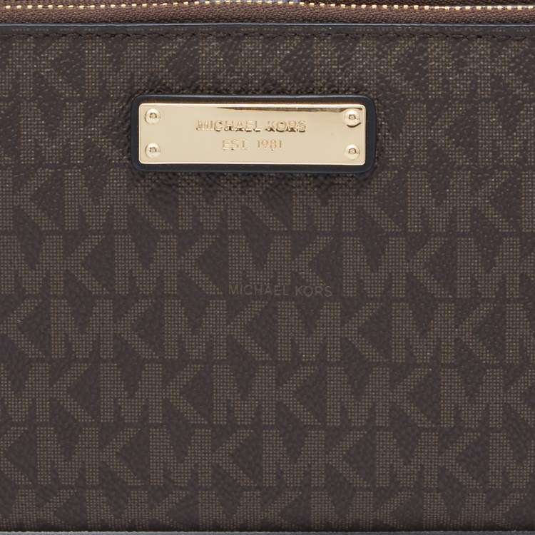 Pre Owned Michael Kors Brown Signature Coated Canvas Adele Smartphone Wallet