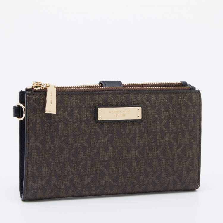 Pre Owned Michael Kors Brown Signature Coated Canvas Adele Smartphone Wallet