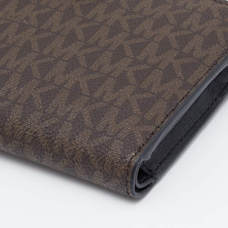 Pre Owned Michael Kors Brown Signature Coated Canvas Adele Smartphone Wallet