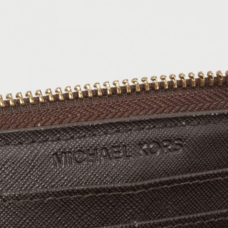 Pre Owned Michael Kors Brown Signature Coated Canvas Studded Zip Around Wallet