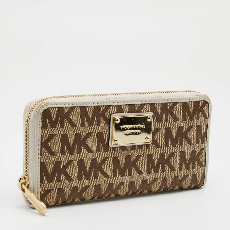 Pre Owned Michael Kors Beige/White Signature Canvas and Leather Zip Around Wallet
