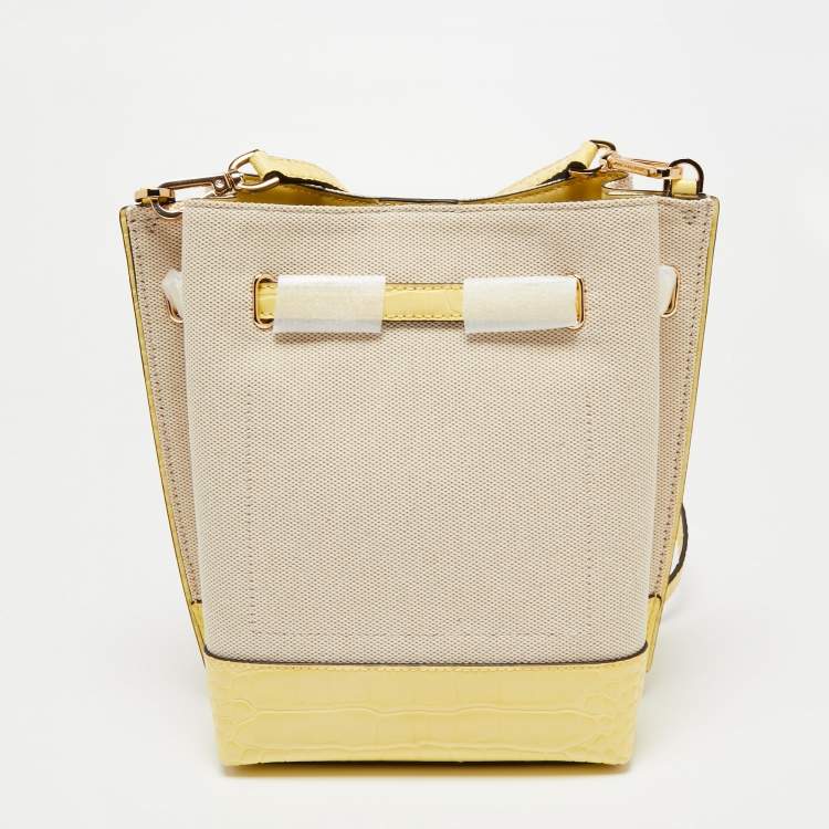 Pre Owned Michael Kors Beige/Yellow Canvas and Leather Small Emilia Bucket Bag