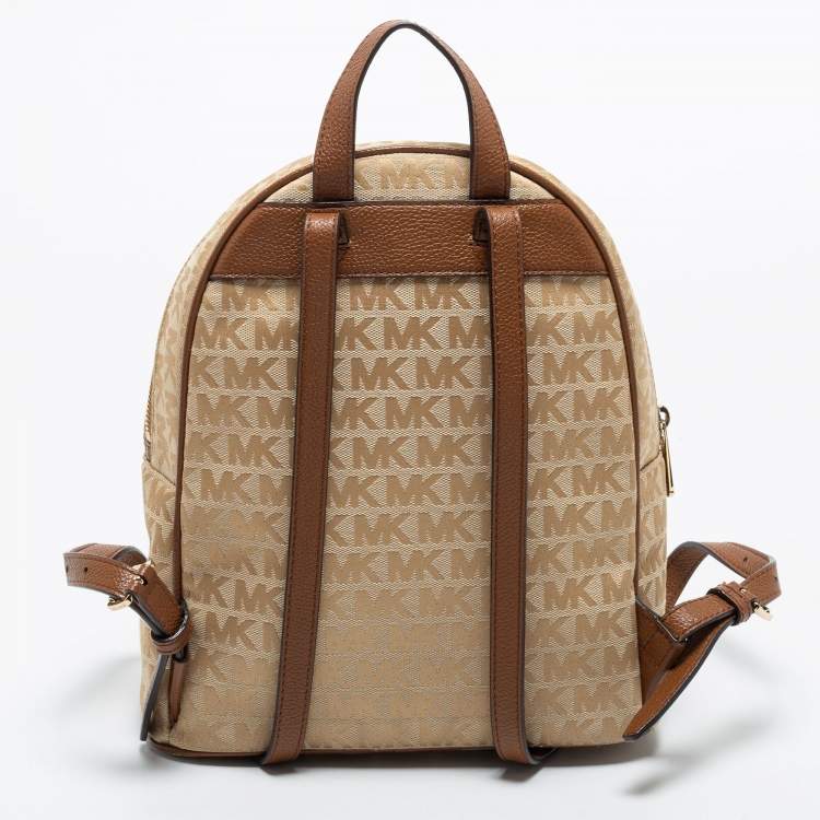 مملوكة مسبقًا Michael Kors Beige/Brown Signature Coated Canvas Jet Set Backpack