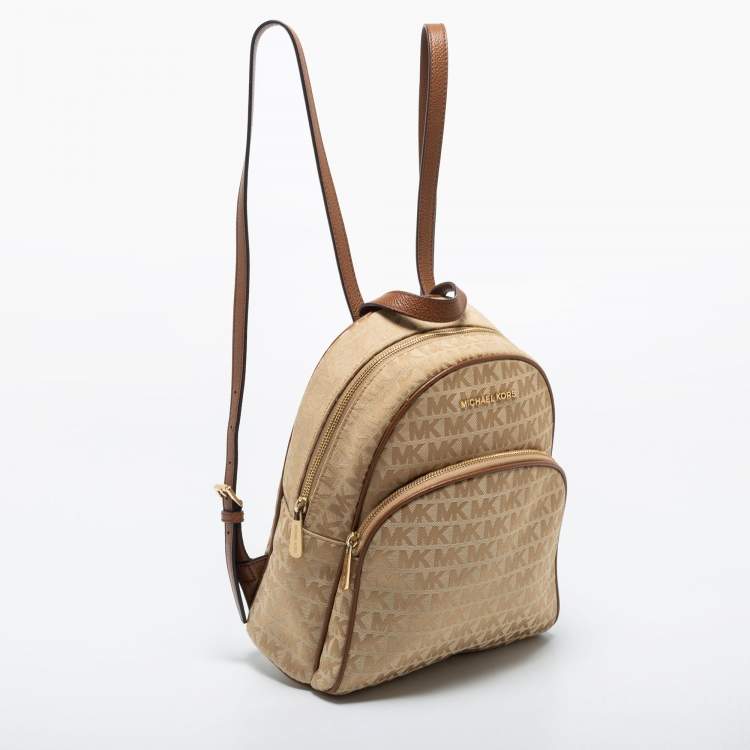مملوكة مسبقًا Michael Kors Beige/Brown Signature Coated Canvas Jet Set Backpack