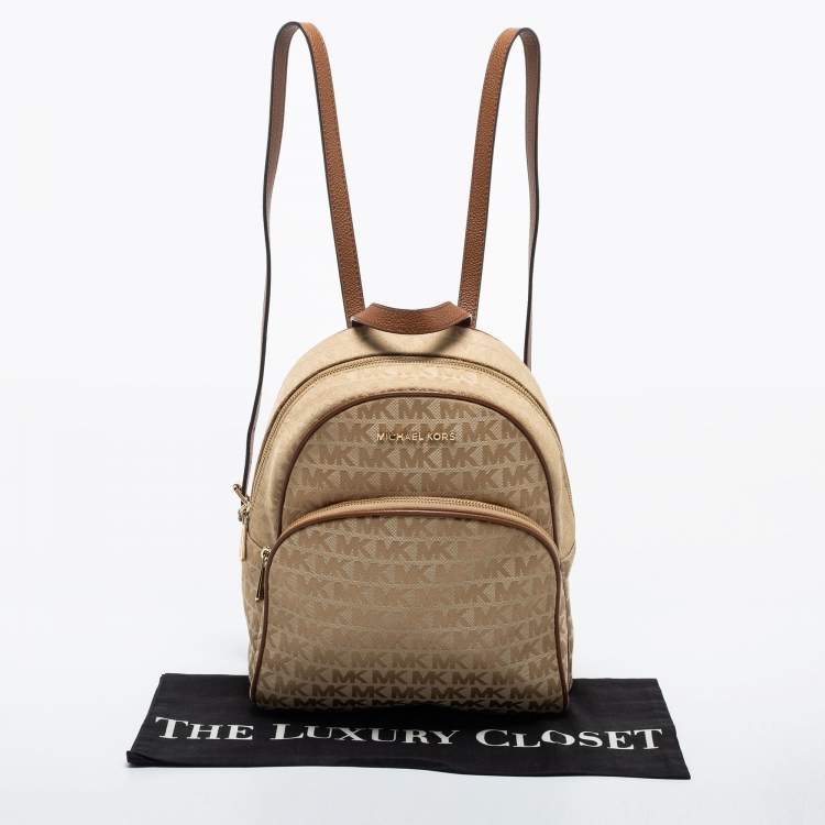 مملوكة مسبقًا Michael Kors Beige/Brown Signature Coated Canvas Jet Set Backpack