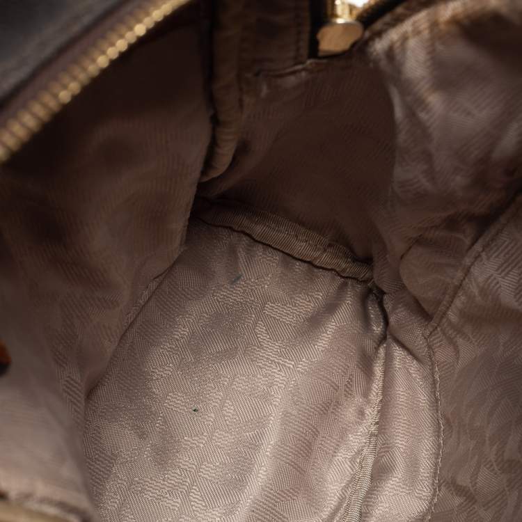 Pre Owned Michael Kors Dark Brown Signature Coated Canvas and Leather Rhea Backpack