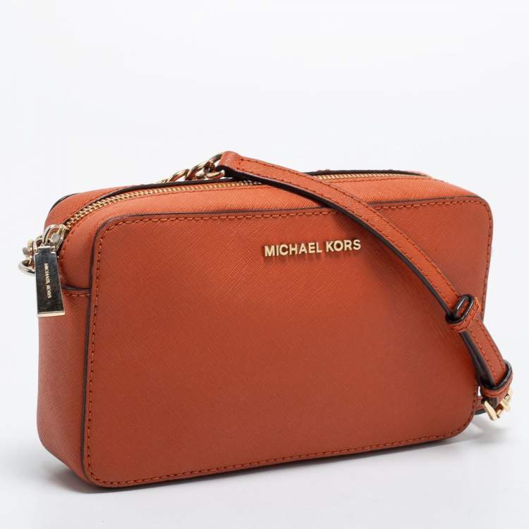 Pre Owned Micheal Kors Rust Brown Leather Zip Jet Set Crossbody Bag